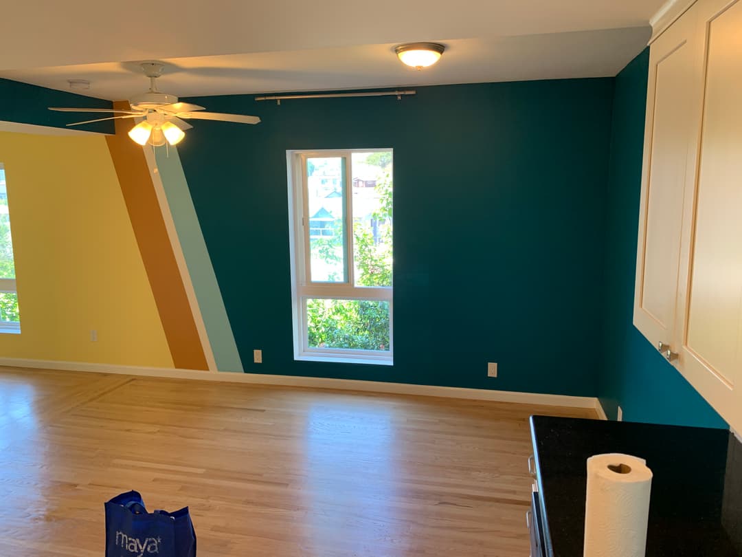 freshly painted dining room with variety of green and yellow colors